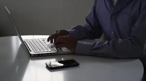 Busy multitasking businessman. computer and phone. Stock Footage 30325343