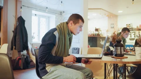 Busy multitasking office. Focused worker handling multiple devices. Person Stock Footage 333319718