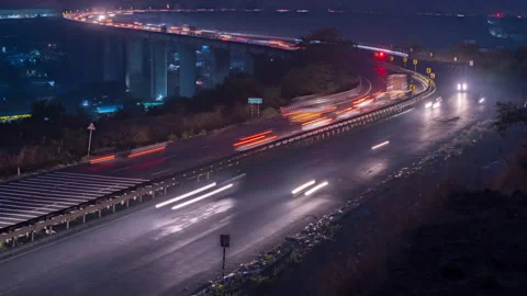 Busy Night Traffic Time Lapse on Curvy S Shaped Mumbai-Pune-Bengaluru Highway Stock Footage 150314641