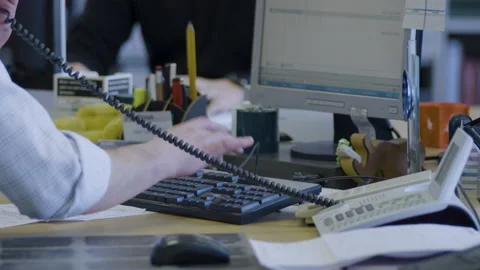 Busy Office worker typing on computer keyboard while calling - desktop chaos Stock Footage 158763154