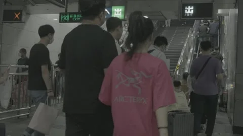 Busy Passenger Flow Through Beijing Subway Exit Concourse Видео 341457203