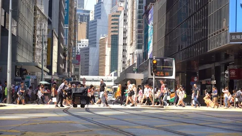 Busy pedestrian and Traffic crossing at Busy streets Stock Footage 125401341