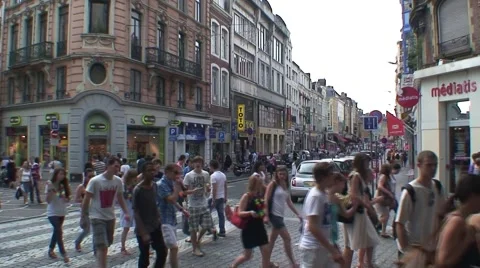 Busy Pedestrian Crosswalk in France Stock Footage