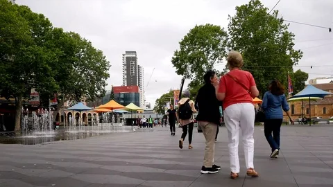 Busy pedestrian mall crowds of people walking timelapse Stock Footage 100050737
