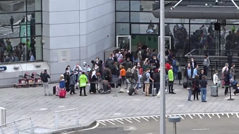 Busy Queue for Temperature Check at an International Airport Stock Footage 134640626