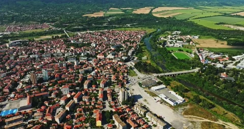 Busy River Bridge Connecting Small Town And Newly Built Worker District Stock Footage 289417890