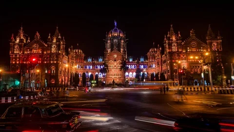 Busy road intersection in front of CST train station in Mumbai Stock Footage 119138473