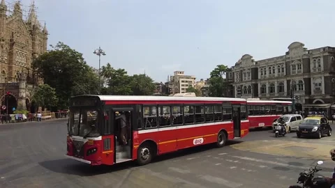 Busy road intersection in front of CST train station in Mumbai. Stock Footage 194418196