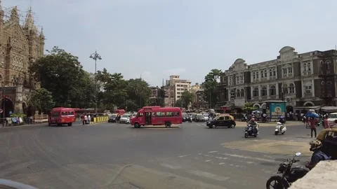 Busy road intersection in front of CST train station in Mumbai. Stock Footage 194418205