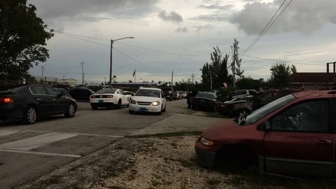 Busy Road Traffic During Back to School Commute in Freeport Bahamas Stock Footage 94551679