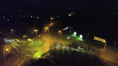 Busy roundabout at night Stock Footage 146818153