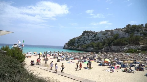 Busy sandy beach Stock Footage 128348992