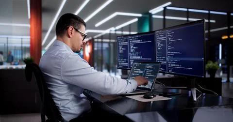 Busy Software Engineer Coding In Office, Developing Web Applications For Comp Stock Photos