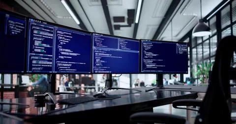 Busy Software Engineer Creating Code On Computer Screen In Office Stock-Fotos