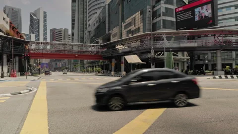 Busy Street Intersection in Kuala Lumpur City Center Stock Footage 334520154
