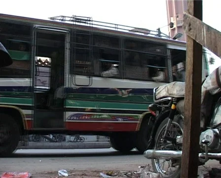 Busy Street outside a Mosque in Karachi, Pakistan Stock Footage