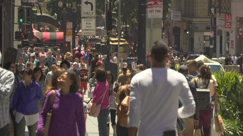 Busy street scene. Crowd of people walking in a shopping street - San Francisco Stock Footage