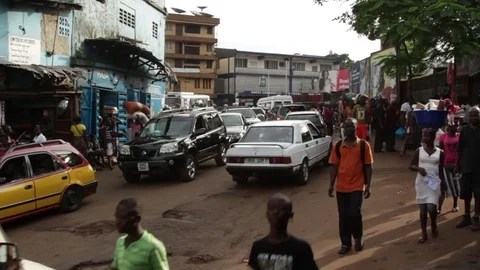 Busy street scene in West Africa Stock Footage