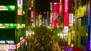 Busy Street At South Shinjuku At Night High Angle 4K Zoom Out Stock Footage
