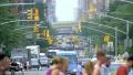 Busy street traffic New York City NYC cars pedestrians people crossing day 4k or 4k+ Resolution