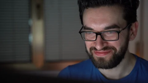 Busy student working at computer with pleasure at home Video stock 108759015