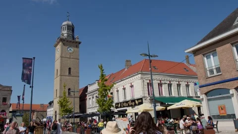 Busy Summer Day at Dunkirk Town Square Clock Tower Stock Footage 323891758