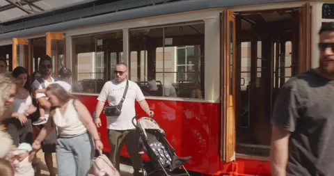 Busy Superga tram station platform with the iconic retro red tram, Turin Stock Footage 340541589