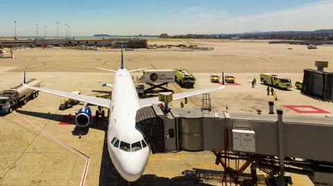 Busy Time-lapse Airport Runway Tarmac Plane Refueling Fire Truck Support Vehicle Stock Footage