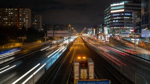 Busy time lapse traffic at night. Seamless loop for use as a background Vídeo Stock 124551435