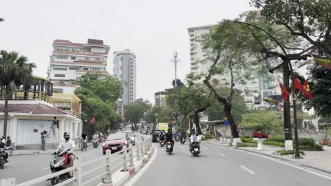 Busy Traffic Along Thanh Nien Road In Hanoi Vietnam Stock Footage 335199057