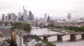 Busy Traffic Cars Passing People Commuting Frankfurt Skyline Main River Bridge HD Footage