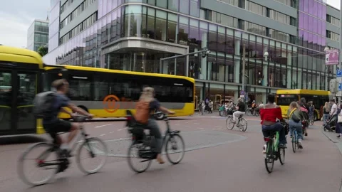 Busy traffic of cyclists and buses in the city center of Utrecht Stock Footage 339581736