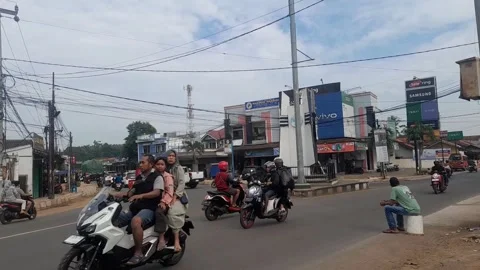 Busy Traffic Flow at a Three-Way Street Intersection Stock Footage 322556541