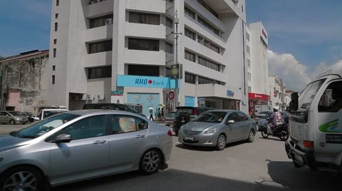Busy Traffic In Front of RHB Bank on Beach Street in Georgetown, Penang Stock Footage 48140882
