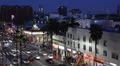 Busy Traffic Hollywood Boulevard Illuminated Evening Night Car Passing People HD Footage