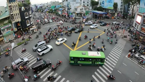 Busy traffic intersection in Vietnam time lapse video Stock Footage 154797573