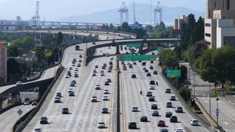 Busy traffic on Interstate 980 freeway in Oakland California with many cars and Stock Footage 335218654