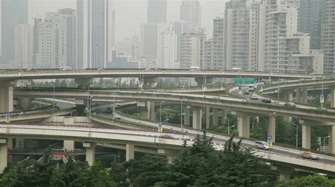 Busy traffic over overpass in modern city , Shanghai, China Stock Footage 39671682