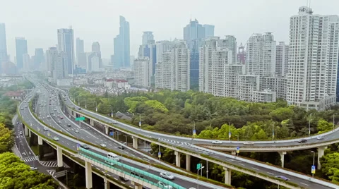 Busy traffic over overpass in modern city , Shanghai, China Stock Footage 39678879