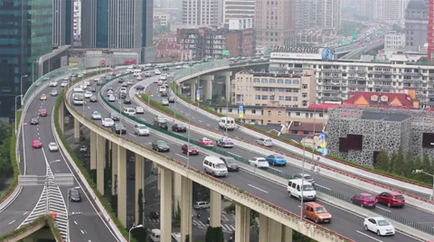 Busy traffic over overpass in modern city , Shanghai, China Stock Footage 39701856
