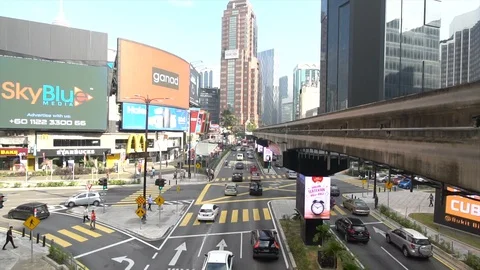 Busy traffic, vehicles, pedestrian on conjunction road at Bukit Bintang. Stock Footage 87852353