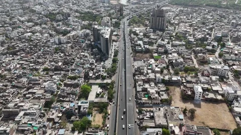 Busy workday scenes in Jaipur’s developing neighborhoods Video stock 309009598