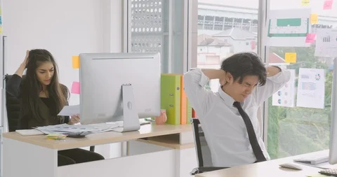 Busy young worker in the office Stock Footage 92183948