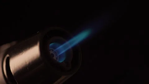 Butane Torch Lighter emits a Blue Flame. Stock Footage 259877109