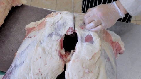 Butcher cut sheep meat. Make a sacrifice of a sheep on Kurban bayram. Stock Footage 125011902