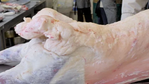 Butcher cut sheep meat. Make a sacrifice of a sheep on Kurban bayram. Stock Footage 125017728