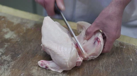 Butcher Cutting Up Chicken - Close Stock Footage 55825149