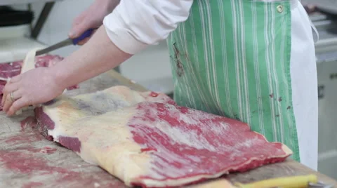 Butcher Cutting Fat Off Beef Stock Footage 55824722
