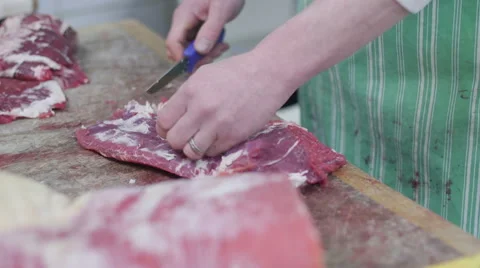Butcher Cutting Fat Off Beef Stock Footage 55824827