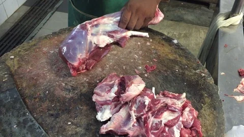 Butcher cutting lamb meat Stock Footage 119473130